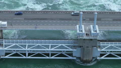 Aerial view of the Eastern Scheldt storm surge barrier with traffic, a marvel 스톡 동영상 338125519