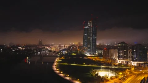 Aerial view of the ECB and bridge at night, Germany. Video stock 321688347