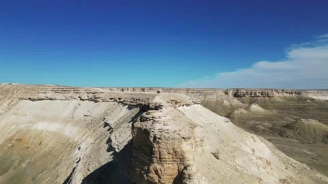 Aerial view on the edge of cliffs with rocky peaks Stock Footage 237945311