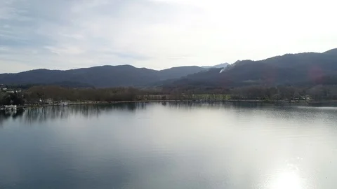 Aerial view of the edge of a pond Stock Footage 106400011