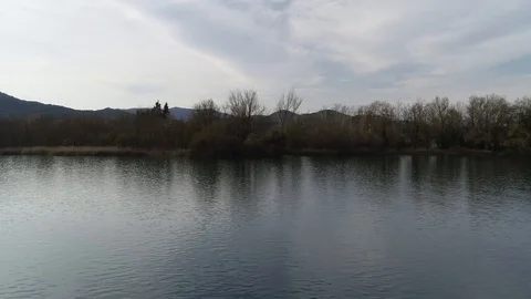 Aerial view of the edge of a pond Stock Footage 106400298