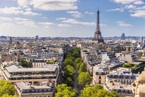 Aerial view of the Eiffel Tower and Haussmannian city rooftops from Arc de 스톡 사진
