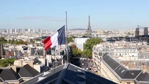 Aerial view of the Eiffel tower over the French flag in Paris, France Stock Footage 316886037