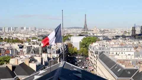 Aerial view of the Eiffel tower over the French flag in Paris, France Stock Footage 316886039