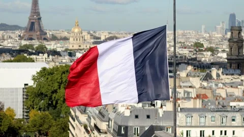 Aerial view of the Eiffel tower over the French flag in Paris, France Stock Footage 316886048