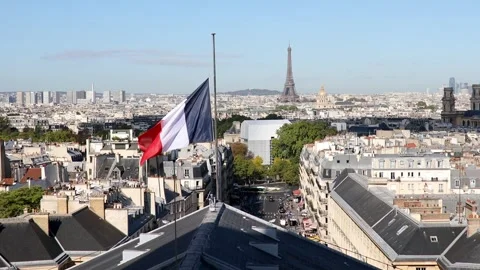 Aerial view of the Eiffel tower over the French flag in Paris, France Stock Footage 316886063