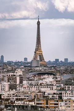Aerial view of Eiffel tower surrounded by buildings in Paris Stock Photos