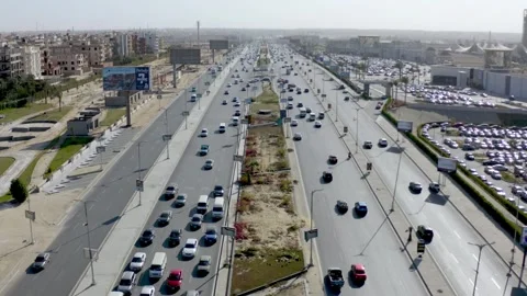 Aerial View of El Mehwar Showcasing Vibrant Traffic and Urban Life Stock Footage 317932753