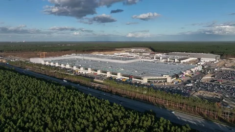 Aerial view of an electric car and battery factory in Grünheide, Germany Stock Footage 227201853