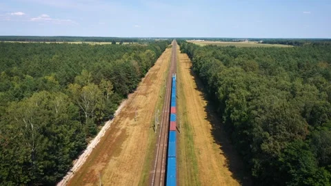 Aerial View Of An Electric Train With Cargo Railway Wagon Transportation By Rail Stock Footage 143145166