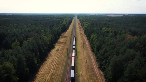 Aerial View Of Electric Train With Cargo Railway Wagons Transportation By Rail Stock Footage 143419769