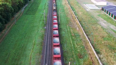 Aerial View Of Electric Train With Cargo Railway Wagons Transportation By Rail Stock Footage 249343205