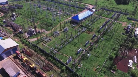 Aerial view. Electrical distribution station, transformers, high-voltage lines Stock Footage 63609544