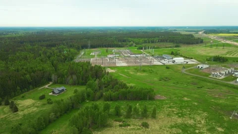 Aerial View of an Electrical Substation and Power Lines in the Countryside Vídeos de archivo 336651092