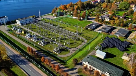 Aerial view of electrical substation and solar panels in Latvia. Stock Footage 341963080