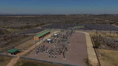 Aerial View of Electrical Substation Beside Solar Farm Video stock 342624540