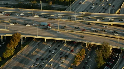 Aerial view of elevated freeways busy with traffic Los Angeles Stock Footage 64778495