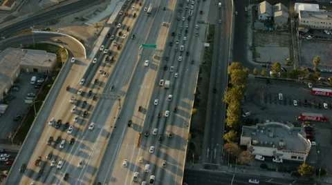Aerial view of elevated freeways busy with traffic Los Angeles Stock Footage 64778709