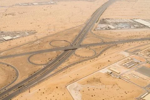 Aerial view of an elevated interchange in a desert landscape Stock Photos