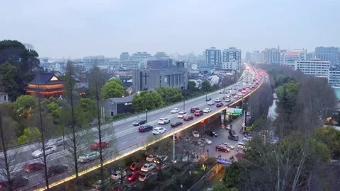 Aerial view of elevated road in midtown of hangzhou at twilight Stock Footage 194902629