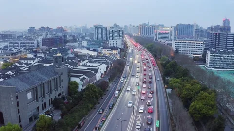 Aerial view of elevated road in midtown of hangzhou at twilight Stock Footage 194902929