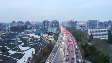 Aerial view of elevated road in midtown of hangzhou at twilight Stock Footage 194903453