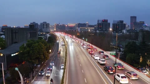 Aerial view of elevated road in midtown of hangzhou at twilight Stock Footage 194922547