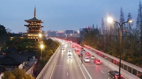 Aerial view of elevated road in midtown of hangzhou at twilight Stock Footage 194922631
