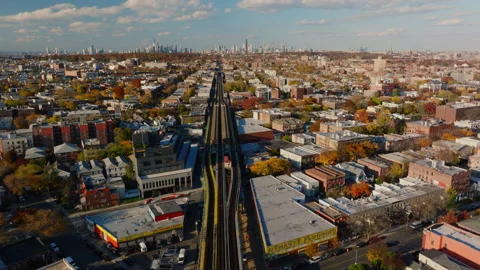 Aerial view of elevated train tracks in Brooklyn, ProRes 422HQ footage Stock Footage 331353348