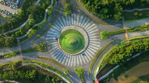 Aerial view of Elmina Roundabout connection to mall and central park Stock Footage 303433978