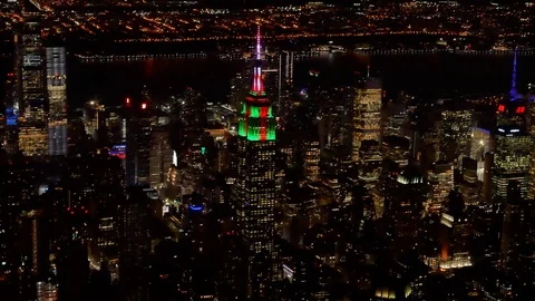Aerial view of Empire State Building adorned in Christmas lighting Stock Footage