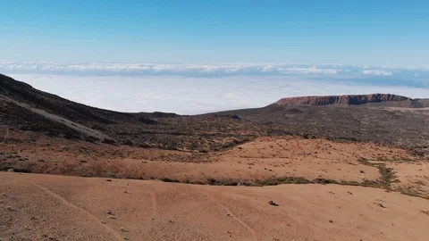 Aerial view of empty and lifeless desert landscape near a volcano. Lunar or Stock Footage 110897205