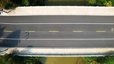 Aerial view of empty asphalt road in suburb Stock Footage 196975725