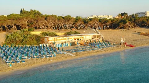 Aerial view of the empty beach and the sea at sunrise Stock-Footage 111875929