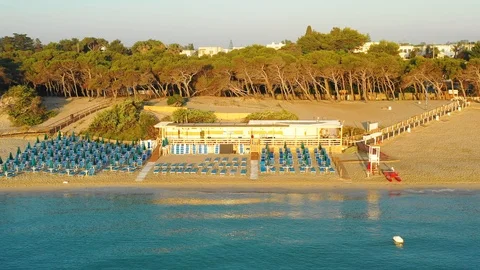 Aerial view of the empty beach and the sea at sunrise Stock Footage 111875960