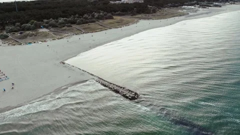 Aerial view of the empty beach at the beginning of the season, in Italy. Stock Footage 131932315