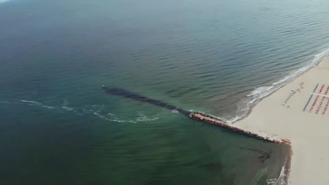 Aerial view of the empty beach at the beginning of the season, in Italy. Stock Footage 131932843