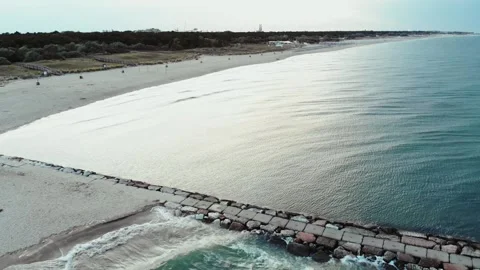 Aerial view of the empty beach at the beginning of the season, in Italy. Stock Footage 131933773