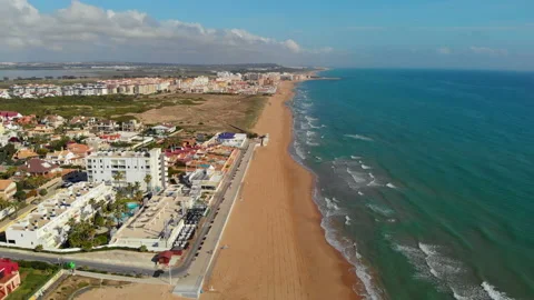 Aerial view empty beach of La Mata during quarantine. Spain Stock Footage 152520923
