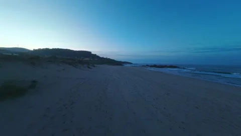 Aerial View Empty Beach With Rocks In The Water Small Waves At Sunset Stock Footage 333219762