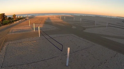 Aerial view of empty beach volleyball courts with nets ready but no people. Stock Footage 129062119