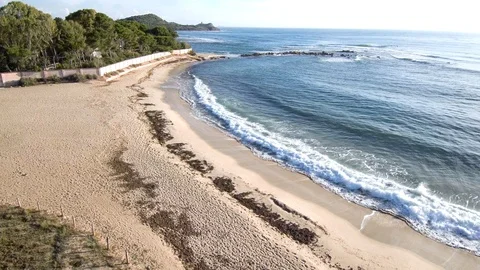 Aerial View on Empty Beach, Waves of Mediterranean Sea, Sardinia, 4K Stock Footage 92517186