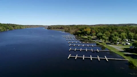 Aerial view of empty boat slips on Lake Saratoga, NY Stock Footage 141149157