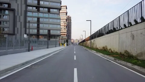 Aerial view of empty car road next to residence site Stock Footage 98789633
