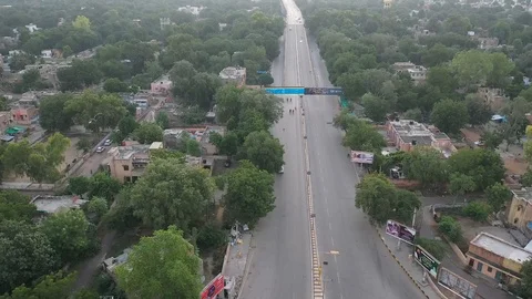 Aerial View Empty highway roads, city lockdown due to SARS-CoV-2, coronavirus Stock Footage 127285765