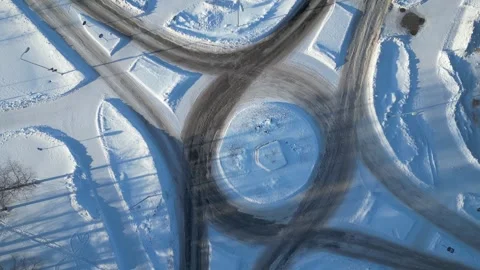 Aerial view of empty icy roundabout in wintertime, Oulu Finland Stock Footage 301763962