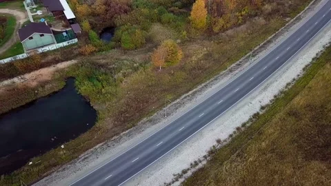 Aerial view of an empty interstate highway. Straight road through the forest Stock-Footage 197028724