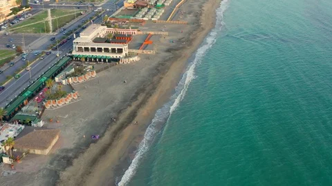 Aerial view of empty Italian beach in Lido di Ostia, Italy, drone shot Video stock 126353633