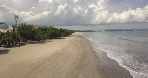AERIAL VIEW OF EMPTY LEGIAN BEACH DURING COVID LOCKDOWN Video stock 136661775