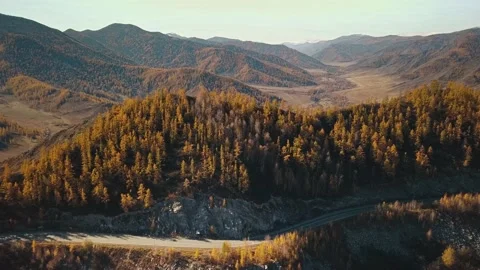 Aerial view of the empty, lonely serpentine mountain road at high altitude Stock Footage 150051697